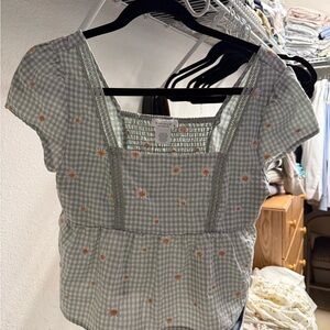 Elegant Green Checkered Blouse with Floral Details